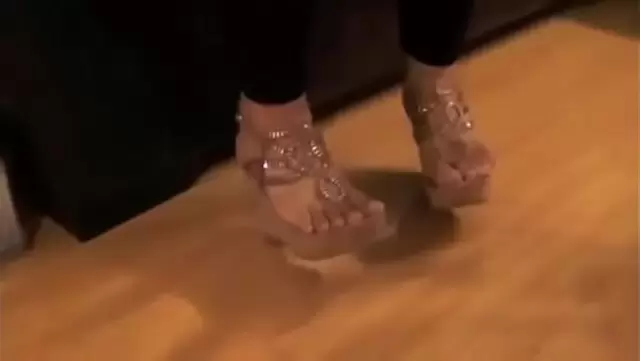 Armenian woman in sandals showcases her beautiful feet